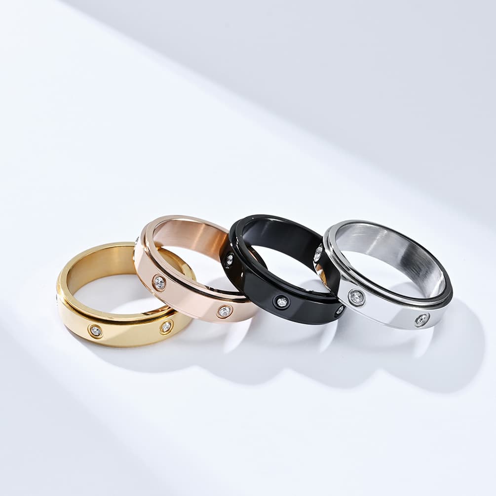 Anel fidget moderno feminino de aço inoxidável com banho de ouro 18K e pedras preciosas, para alívio da ansiedade, vendido no atacado pela